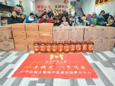 從豬圈屋走出的愛心使者-謝武杰冒雨助殘，傳承雷鋒精神